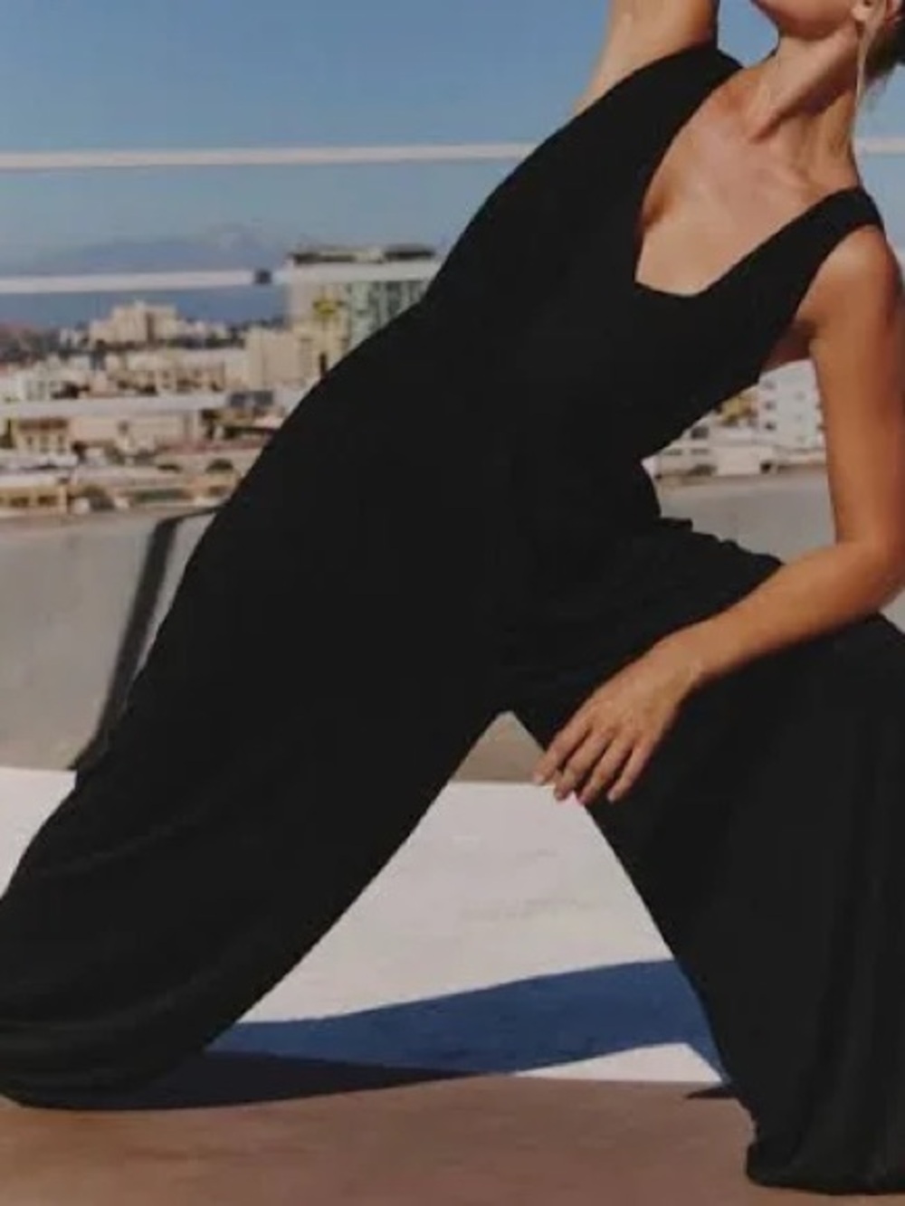 FP Movement by Free People Breezy Day Jumpsuit in Black